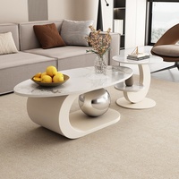 Table basse ovale en métal et ardoise de style italien moderne et luxueux pour salon dans les petits espaces avec tiroirs