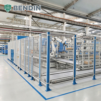 Clôture de sécurité robotisée en acier à faible teneur en carbone sur mesure avec fixation au sol stable pour zones de travail de machines CNC et protection flexible des machines