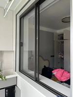 Fenêtre coulissante en aluminium à rupture de pont thermique avec panneau supérieur fixe pour maison, villa, vente en gros à l'étranger