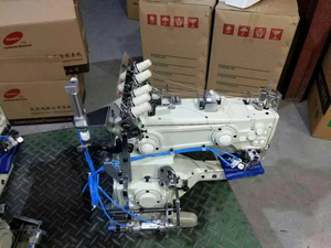 โรงงานขายส่งจักรเย็บผ้าอุตสาหกรรมแบบแขน รุ่น 1500D-356-EST แบบสามเข็มห้าเส้นเย็บแบบอินเตอร์ล็อค - Product Image 6