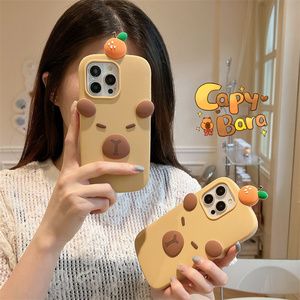 เคสโทรศัพท์ซิลิโคนลายการ์ตูนคาปิบาร่าสำหรับ iPhone 17 16 15 14 Pro max ลายคิตตี้โบว์น่ารัก ยางนิ่มสีส้มพีช ป้องกันการกระแทก - Product Image 2