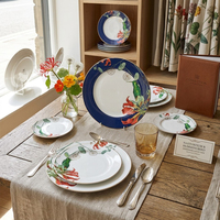 Service de table en céramique de luxe à motifs de feuilles tropicales, bord doré, assiettes en porcelaine fine personnalisées, tasses à thé et à café, soucoupes, ensemble de vaisselle