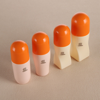 Flacon à bille en verre de couleur personnalisée avec grand bouchon orange 70 ml 100 ml Huile cosmétique parfumée pour le soin de la peau Sérum