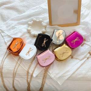 ขายดีเสื้อผ้าแฟชั่นสำหรับเด็กกระเป๋าสะพายไหล่ทรงแมสเซนเจอร์ขนาดเล็กหนังแท้ผูกโบว์สำหรับเจ้าหญิง - Product Image 1