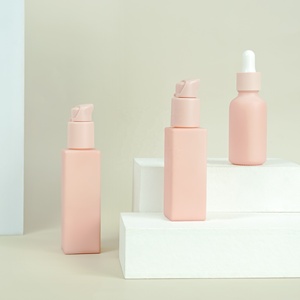 Botella de vidrio suave de color rosa para cuidado de la piel, botella de vidrio suave de 30ml, 50ml, 100ml, 120ml, con bomba sostenible, venta al por mayor - Product Image 1