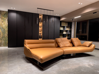 Canapé d'angle minimaliste italien en cuir véritable, design moderne haut de gamme en arc pour salon, cuir de vachette première couche marron
