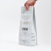 Sachet souple personnalisé à fond plat avec finition mate pour l'emballage de grains de café, thé, aliments en PET, avec valve de dégazage