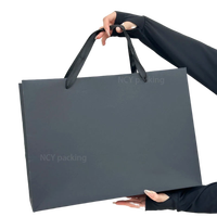 Sac cadeau de luxe en carton noir, personnalisé, durable, avec ruban plat renforcé, fait main, de marque de luxe