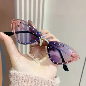 2024 Luxury Trendy Cat Eye Design Metal Frameless UV400 Sunglasses With Rivet Decorations Hot Sale Fashion Item