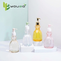 Flacon de lotion corporelle haut de gamme en PET de 300 ml, flacon de gel douche et de shampoing de forme unique, pompe rechargeable