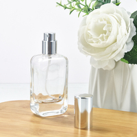 Vente en gros de flacons de parfum en verre rectangulaires transparents de 30 ml avec bouchon argenté, emballés dans un carton imprimé