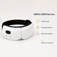 Masseur oculaire chauffant pliable OEM avec compression d'air, vibration, musique Bluetooth, rechargeable par USB