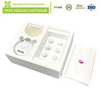 Boîte cadeau durable en pâte à papier avec insert en pâte à papier blanche imprimée sur mesure et moules intérieurs en pâte à papier, conception gratuite