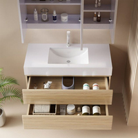 Vente directe d'usine de meubles modernes de luxe flottant de 28 pouces Armoire de salle de bain en bois Miroir LED Ensemble de vanité avec évier en céramique