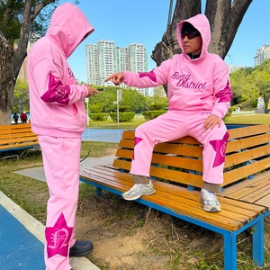 ชุดเซ็ตเสื้อฮู้ดดี้และกางเกงวอร์มทรงหลวมคุณภาพสูงพร้อมโลโก้แบบกำหนดเอง ชุดวอร์มสองชิ้น กางเกงจ็อกเกอร์ ชุดแทรคสูทสีชมพู เสื้อฮู้ดดี้และกางเกงวอร์ม - Product Image 1
