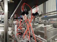 Machine automatique d'assemblage de cloisons pour boîtes en carton