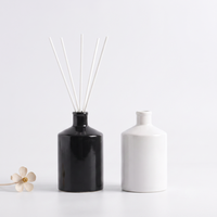 Vases diffuseurs modernes en céramique noire et blanche, mini-bouteilles diffuseuses personnalisées avec bâtonnets, en gros pour la décoration intérieure