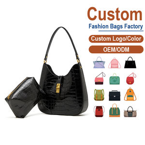 Bolso Hobo de Piel Negra con Acabado Patentado - Cierre Giratorio Dorado, Incluye Bolsa Adicional, Espacioso y Elegante - Product Image 1