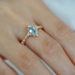 Bague de fiançailles en argent sterling S925 avec un design élégant et vintage, sertie d'une pierre ovale en aquamarine, style fleur, vente en gros - Product Image 6