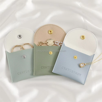 Sac pochette bleu personnalisé en PU pour bijoux avec bouton vente en gros de sacs d'emballage pour bijoux pochettes en cuir pour bijoux avec logo imprimé