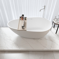 Baignoire autoportante ovale moderne en pierre artificielle blanche, durable, avec drain central, modèle TONA NCL, garantie 1 an