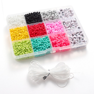 Piezas de cerámica blanda más vendidas, cuentas de arroz con letras en caja de 12 rejillas, cuentas de cerámica blanda, accesorios de joyería DIY con cuentas a mano - Product Image 1
