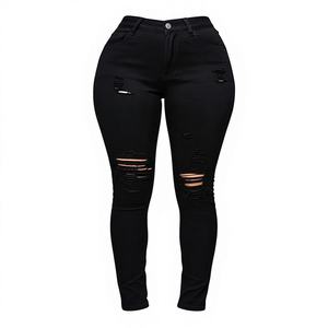 Jeans ajustados de cintura alta para mujer, estilo urbano chic, color negro sólido, con rotos, para uso diario. - Product Image 1