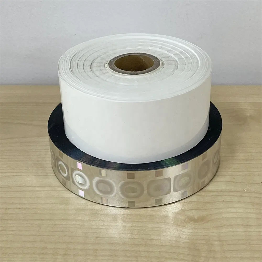 Folha de estampagem a quente de posicionamento holográfico por atacado de padrão prateado premium para impressão de embalagens