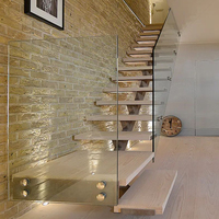 Escalier mono-tringle moderne sur mesure Prima avec marches en bois pour villas, lofts et bâtiments commerciaux