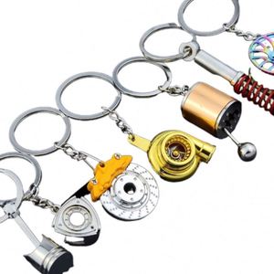 Porte-clés en métal pour accessoires automobiles en gros, pendentifs porte-clés de voiture, porte-clés disque de frein et amortisseur - Product Image 1