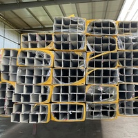 Profilé en aluminium argenté 6063 personnalisé en Chine pour le service de traitement de coupe d'extrusion de teinte de bois de Windows pour le marché irakien colombien