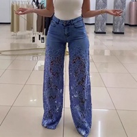 Celana Denim Wanita Bergaya Streetwear dengan Saku Kancing, Aksen Rajut, Renda, dan Lubang-Lubang Bunga, Pinggang Tinggi, Cocok untuk Musim Semi dan Panas