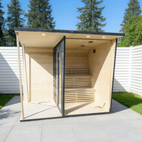 Sauna extérieur moderne en bois de cèdre noir imprimé pour 2 à 6 personnes, avec poêle à vapeur et pierres volcaniques, idéal pour villa ou parc.
