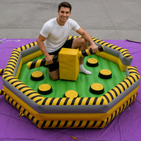 Jeu gonflable d'élimination extérieur Last Man Standing Wipeout Black Meltdown avec kits de réparation, type château, en promotion