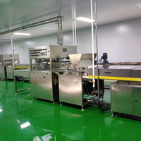 Nouvelle machine d'enrobage au chocolat GUSU avec tunnel de refroidissement pour usine de snacks, garantie 1 an, tension universelle