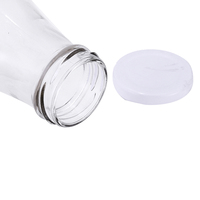 Grande bouteille en verre transparent de 1000 ml pour smoothies, yaourts, lait, jus, sodas et autres boissons, avec bouchon à vis et joint.