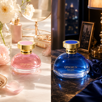 Flacon de parfum en verre transparent avec col doré et emballage assorti