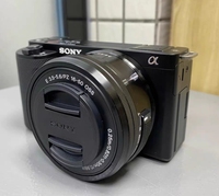 Caméra vidéo d'occasion Sony ZV-E/ZVE10 4K avec capteur CMOS, objectif 16-50mm, carte SD, écran 2-3 pouces, zoom <2x, batterie au lithium – Idéale pour le vlogging