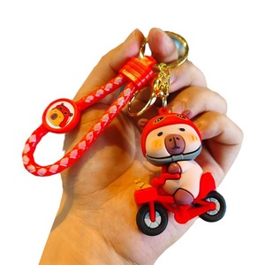 Llavero de gel de silicona Capibara en bicicleta, regalo de dibujos animados, llavero de anime lindo, colgante para bolso empaquetado individualmente - Product Image 5