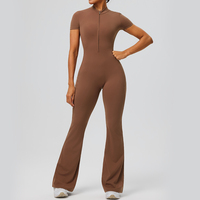 Combinaison de sport décontractée pour femme, demi-zip, manches courtes, pour la gym, avec contrôle du ventre et poches latérales, une pièce