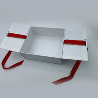 Boîte en papier de luxe en carton recyclable avec logo personnalisé en vente libre avec nœud en ruban pour vêtements Boîte d'emballage pour chaussures Boîte cadeau