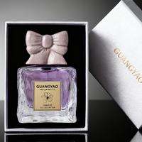 Flacon de parfum nouvellement conçu 100 ml Flacon de parfum pour femmes Vaporisateur de parfum Flacon de parfum en verre Emballage personnalisé avec bouchon en céramique