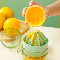 Presse-agrumes manuel bidirectionnel Migecon en plastique pour citrons et oranges