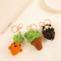 Porte-clés en forme de carotte en crochet tricoté, mignon, pendentif pour sac à dos, en fil Grass Dango, design anime d'Asie du Sud-Est, en métal tendance