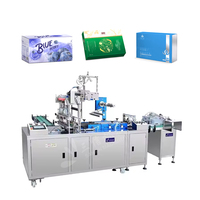 Machine d'emballage sous film transparent pour boîtes de biscuits, boîtes de dentifrice et boîtes de produits de santé