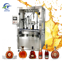 Machine de remplissage automatique à tête unique par succion sous vide pour bouteilles de spiritueux (gin, tequila, liqueur, vodka, vin) avec suivi du niveau