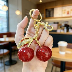 Llavero de resina con diseño de cereza de dibujos animados, colgante para bolso, venta al por mayor, llavero de cristal, dijes para bolso de mujer, llavero de cereza de cristal - Product Image 1