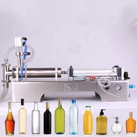 Machine de remplissage liquide pneumatique à piston à double tête horizontale Machine de remplissage pneumatique de remplissage de détergent de boisson d'huile de shampooing