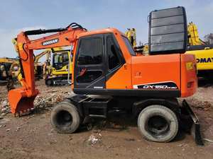 Excavatrice sur roues <span class=keywords><strong>DOO</strong></span>-SAN DX150W-9C, 13,5 tonnes, <span class=keywords><strong>d</strong></span>'<span class=keywords><strong>occasion</strong></span>, 103 kW, équipement de construction à vendre - Product Image 3