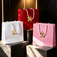 Sac à bijoux en similicuir blanc gaufré effet litchi de luxe, avec logo cœur en feuille d'or et poignée en corde tressée
